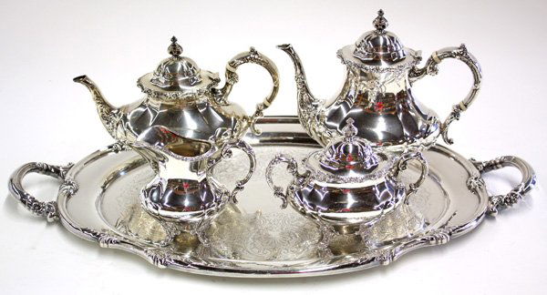 Reed and Barton sterling silver tea set: (lot of 5) Reed and Barton sterling silver tea and coffee set in the Georgian Rose Pattern, comprising teapot and coffeepot with ivory insulators, creamer and covered sugar bowl, together with a Reed