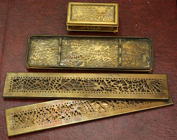 Tiffany Studios Desk Set: (lot of 4) Tiffany Studios bronze desk set in the spiderweb pattern including two blotter ends (stamped 998), a stamp box (stamped 801) and pen tray (stamped 1004)