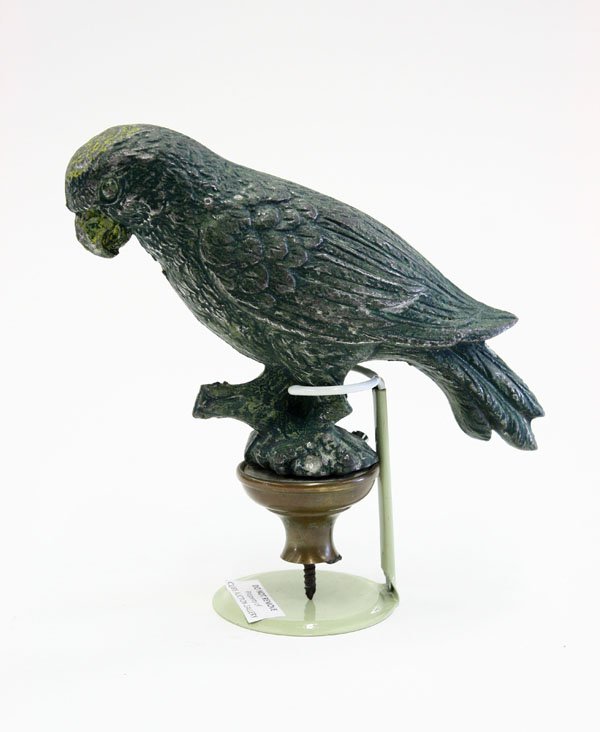 Vintage cast metal sculpture of a parrot: Vintage cast metal sculpture of a parrot in green paint mounted to a brass screw base, 8.5''h (display stand no included)