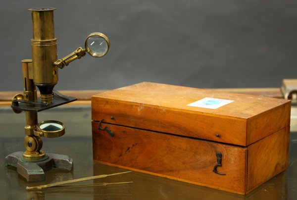 Cased brass microscope, blood pressure: (lot of 2) cased brass microscope 6.5''h together with a cased blood pressure cuff 2.5''h x 14''l