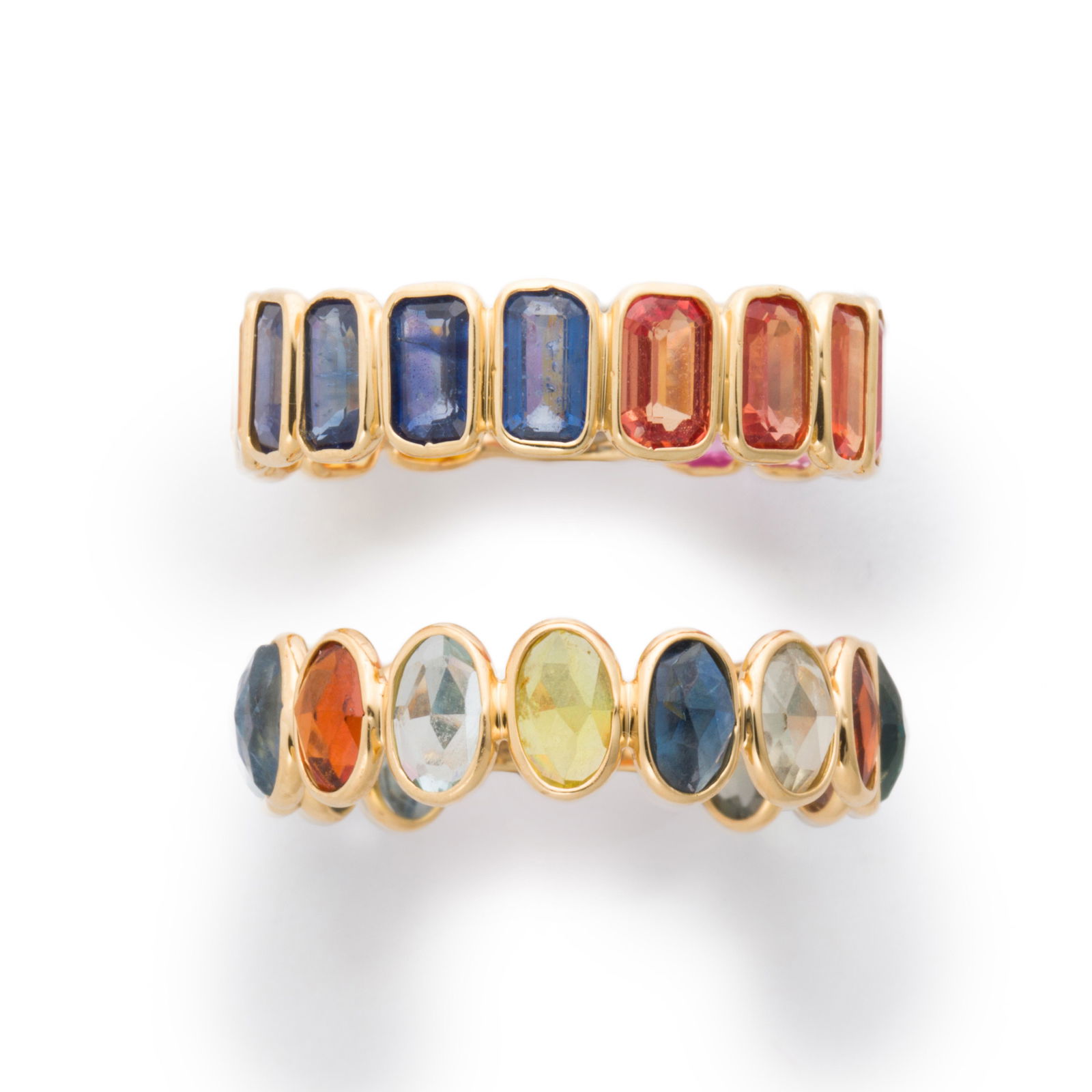 A pair of multi-hued sapphire and eighteen karat gold (1 of 1)