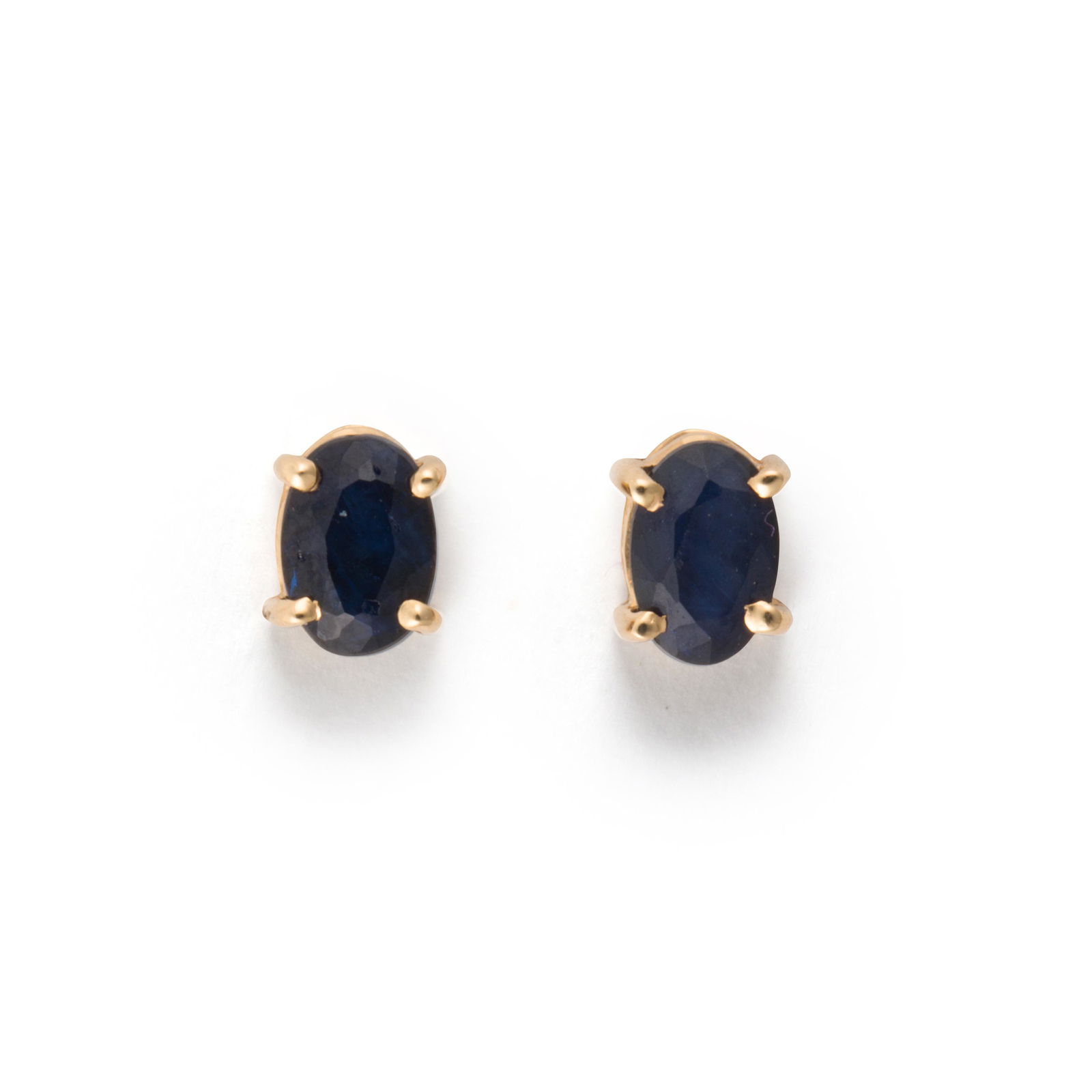 A pair of sapphire and fourteen karat gold stud (1 of 1)