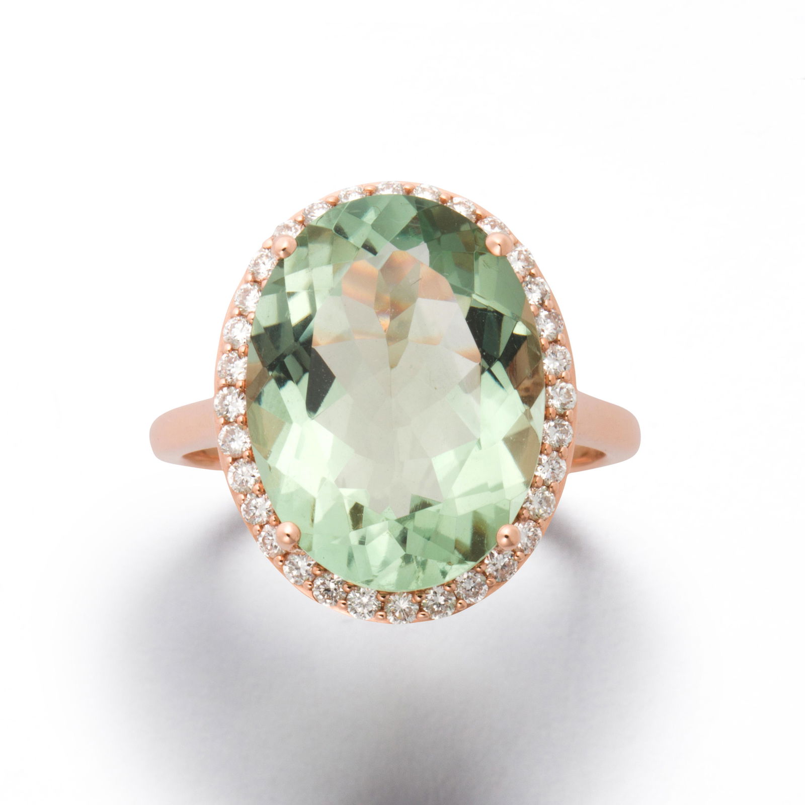 A bluish green quartz, diamond and fourteen karat rose (1 of 2)