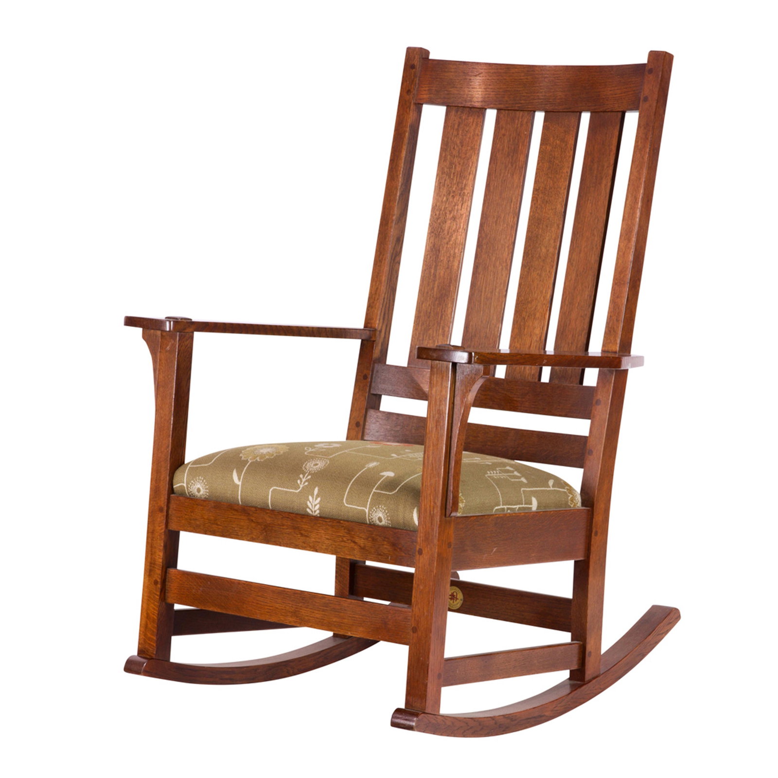 Stickley (Audi) Arts and Crafts rocking chair: Stickley (Audi) Arts and Crafts rocking chair, with a 4 slat back , through tenon arms and pegged construction, retains marks and plaque to underside, 40 1/2"h x 28"w x 30"d