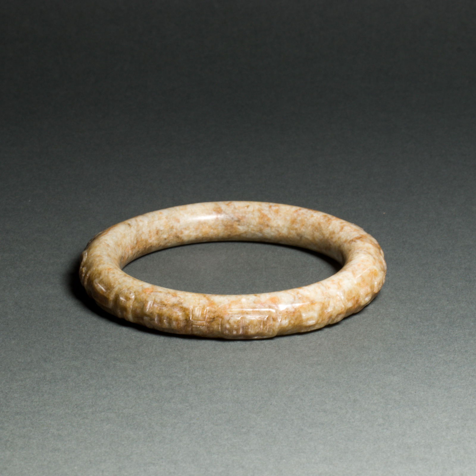 Chinese mottled jade bangle (1 of 3)