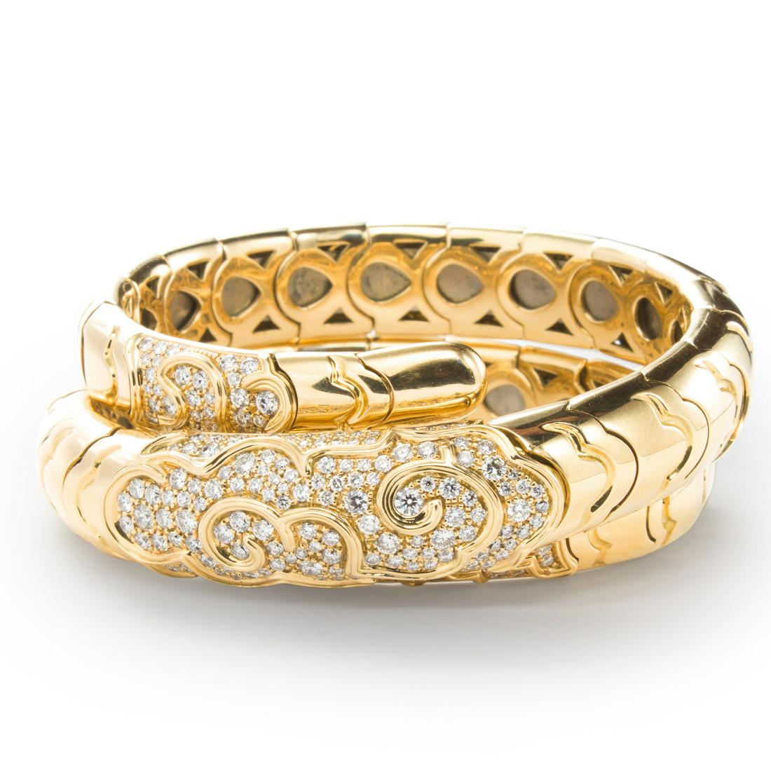 An eighteen karat gold bracelet, 'Onda Serpentine', (1 of 2)