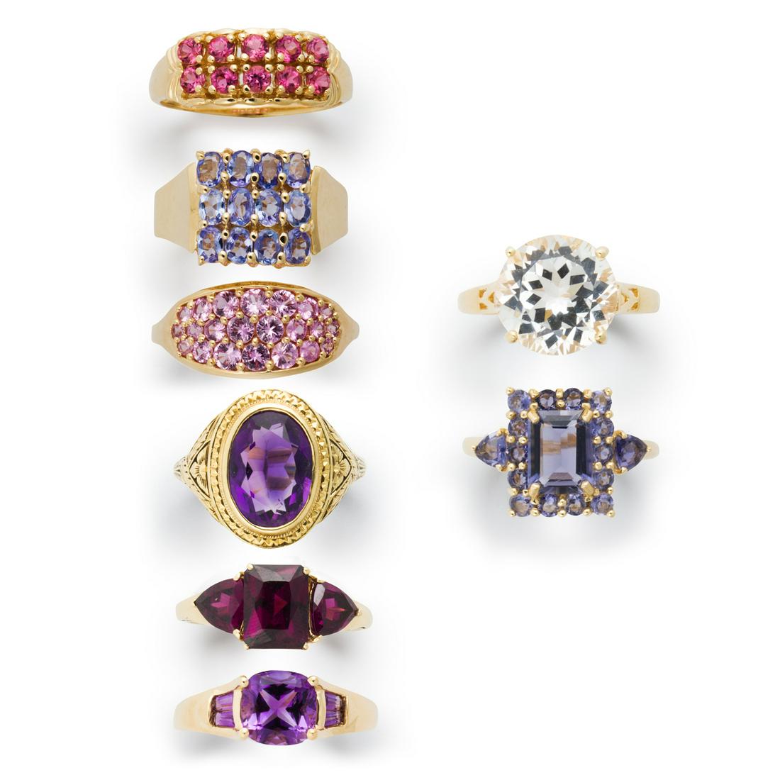 A group of colored quartz and fourteen karat gold rings (1 of 2)
