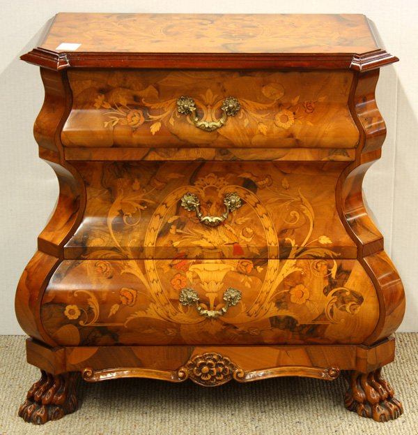 Floral inlaid three drawer commode: Floral inlaid three drawer commode of bombe form, the rectangular top above a heavily inlaid case rising on carved paw feet 25''h x 26''w x 13.5''d, Provenance: The Estate of Dr. Sidney Widrow, Hawaii