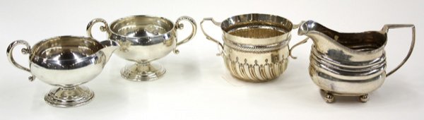 Sterling sugars and creamers: (lot of 4) Assorted English sugars and creamers, including an 1812 creamer having angular fluted handle and contoured pulvinated body terminating in four ball feet, maker's marks similar to Thomas Har