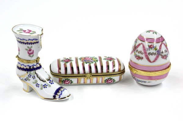 Porcelain hinged boxes: (lot of 3) Porcelain hinged boxes decorated with polychromed flowers and gilt mounts in different shapes including a Victorian boot and egg