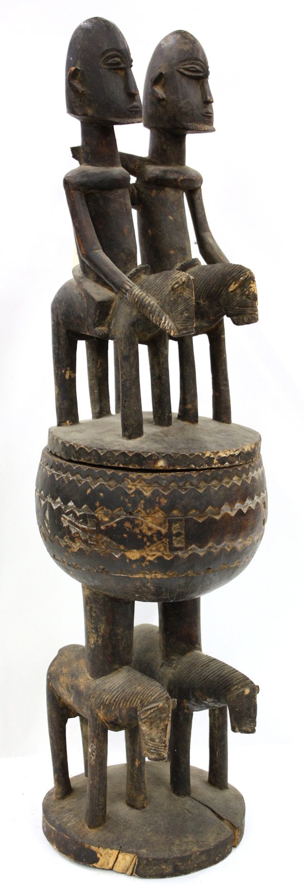 Mali carved wood figural vessel: Dogon style, Mali carved wood figural vessel of double equestrians representing Nommo ancestors, 33.5''h
