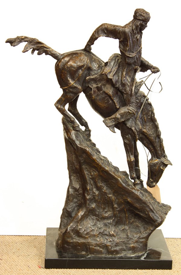 Bronze, after Remington, Mountain Man: Bronze sculpture, ''Mountain Man,'' after Frederic Remington (American, 1861-1909), signed ''Frederic Remington'' on bottom, black marble base, overall: 27''h x 18''w.