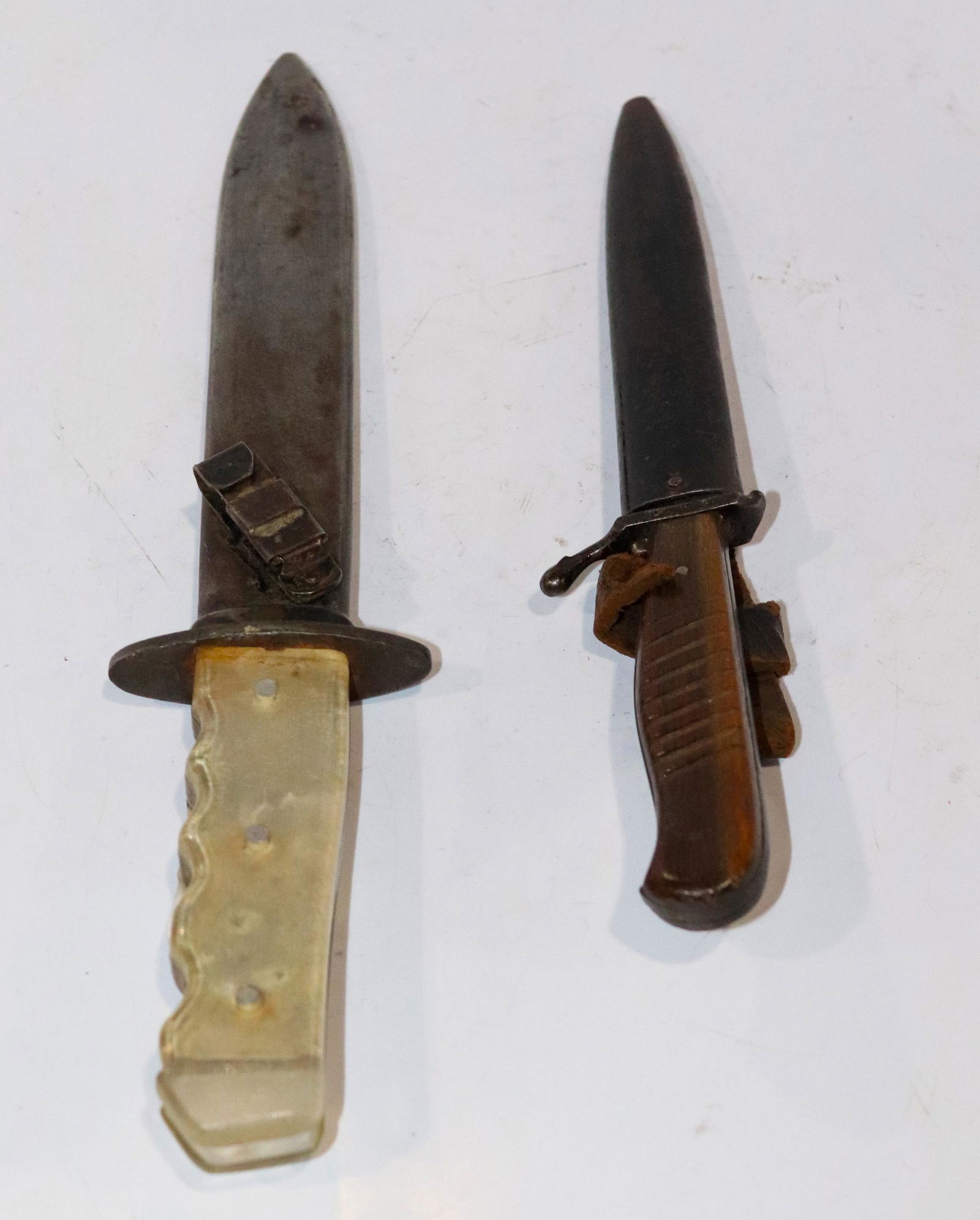 (lot of 2) Daggers, the longer with a lucite handle (1 of 1)