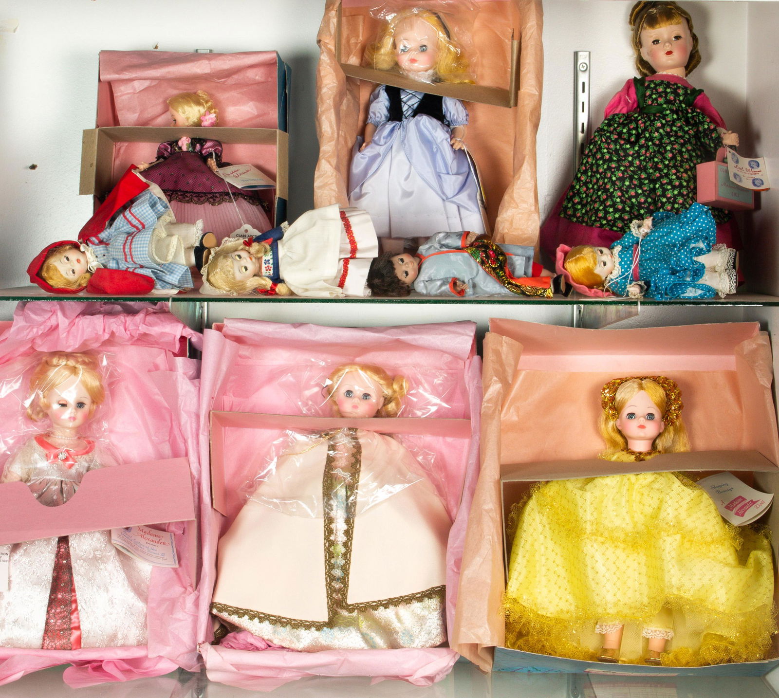Two shelves of assorted dolls, including (6) Madame (1 of 1)