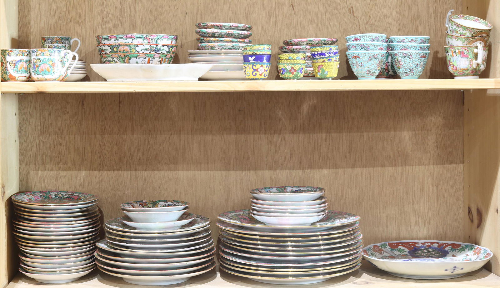 Two shelves of Chinese famille rose and cloisonne wares (1 of 1)