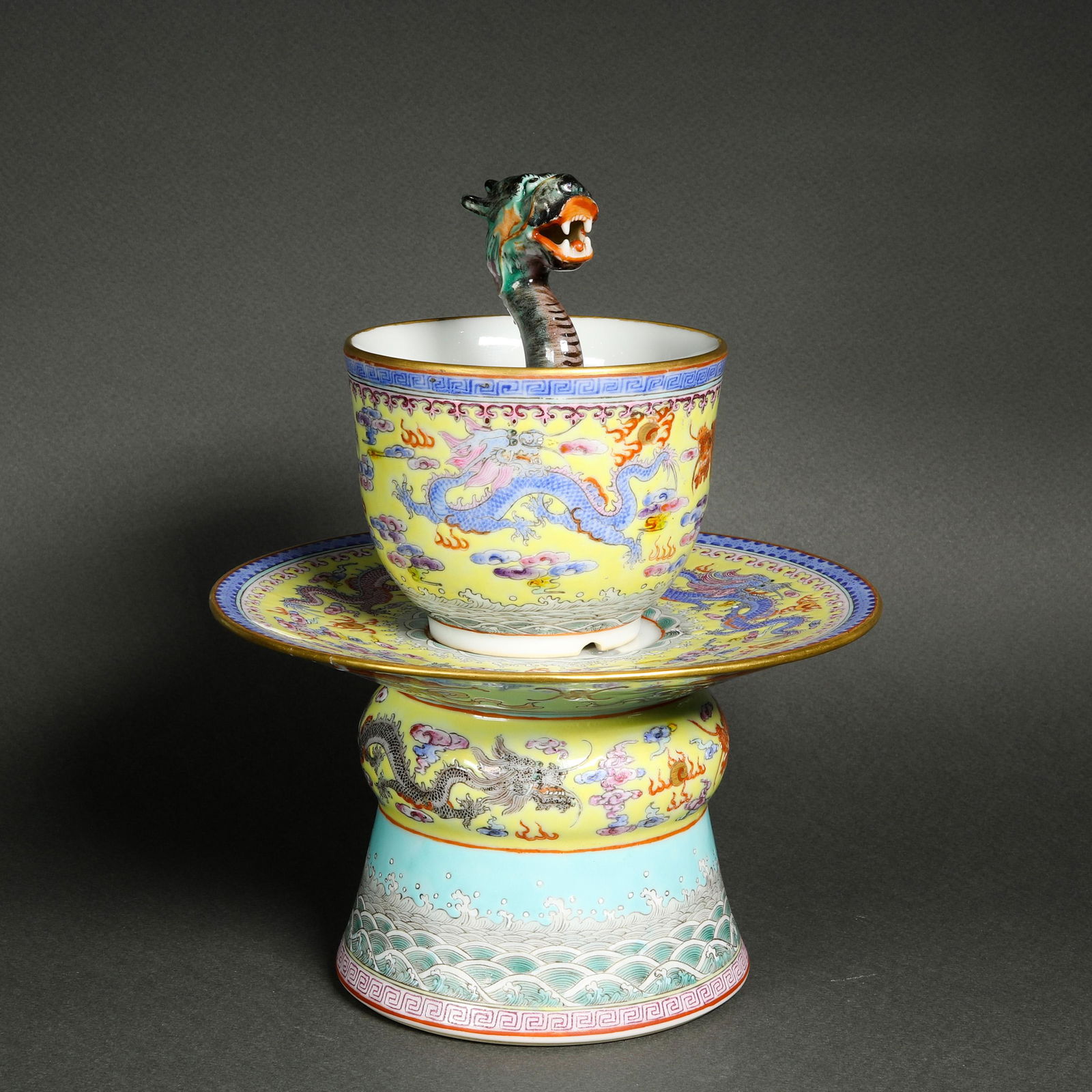 Chinese famille rose wine cup with stem warming tray: Chinese famille rose wine cup with stem warming tray, the tray featuring a six character Qianlong mark on the base, 6.125"dia.