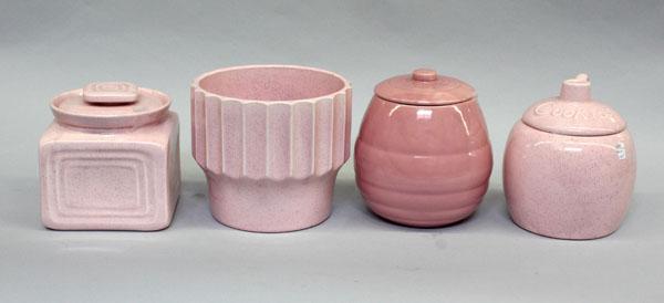 Group of Bauer of California pottery: (lot of 4) Group of Bauer of California pottery, including three cookie jars, largest 8.5''h, and one Biltmore jardiniere 8''h, all executed in pink, two with impressed mark