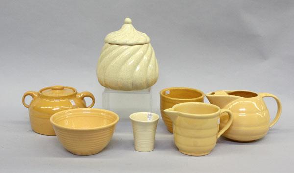 Group of Bauer of California pottery: (lot of 7) Group of Bauer of California pottery, including one cookie jar 8.5''h, one bean pot 6''h, one mixing bowl number 24-4''h, one ring flour pot 5''h, two pitchers, largest 6''h, and one 4''h b