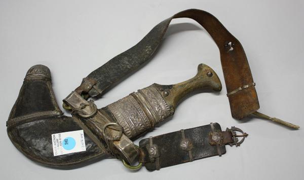 Middle Eastern Dagger: Middle Eastern dagger having a leather and metal mounted sheath, retains the original leather strap 13''l