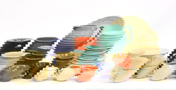 Associated Bauer Pottery: (lot of 48) Bauer Pottery of California Monterey Ring associated articles, including a table service for four in ivory with three serving bowls, a green juice pitcher, cups and stacking bowls, three b