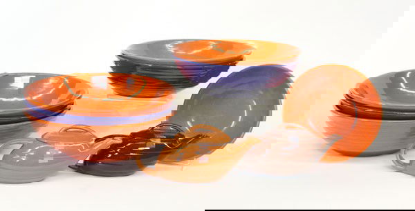 Bauer of California Pottery: (lot of 8) Group of associated Bauer Pottery table articles, including six graduated mixing bowls in orange and blue, largest 14'', and two tea pots 4''h