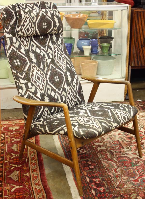 Folke Ohlsson for Dux, lounge chair: Folke Ohlsson (1919-2003), walnut lounge chair, for Dux Industries of Sweden, upholstered in a geometric patterned fabric, circa 1960, 40'' x 29'' x 28''