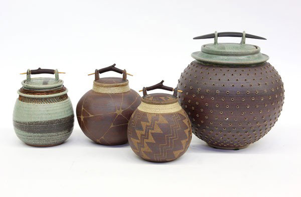 Barry Richmond ceramic storage containers: (lot of 4) Barry Richmond ceramic storage containers, each container retains a lid, with a attached wooden handle, hand thrown, largest 10'' x 9''