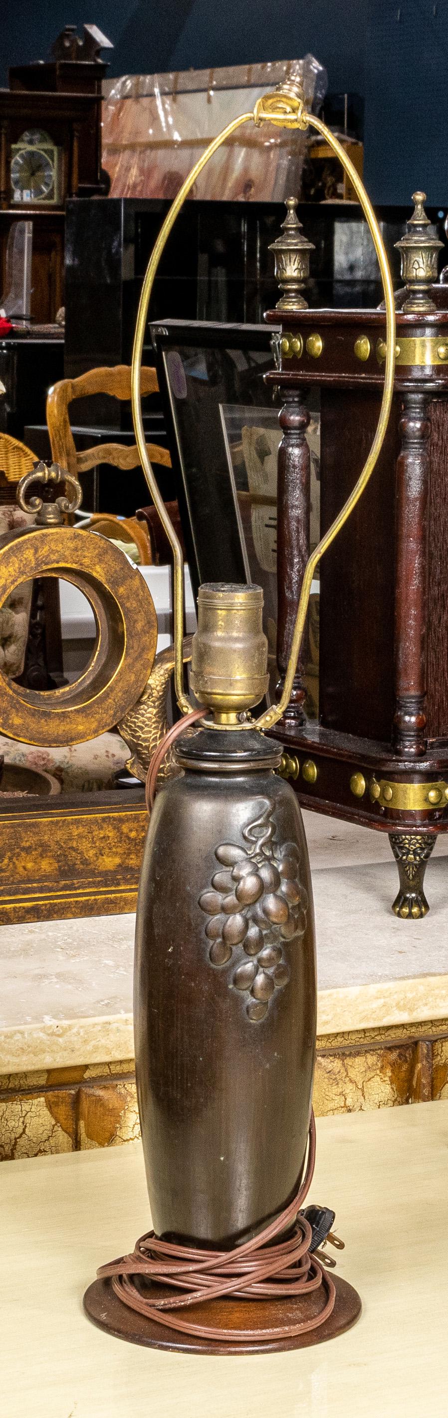 Patinated metal table lamp, decorated with grape: Patinated metal table lamp, decorated with grape bunches in low relief, 24 1/2"h (to top of harp )