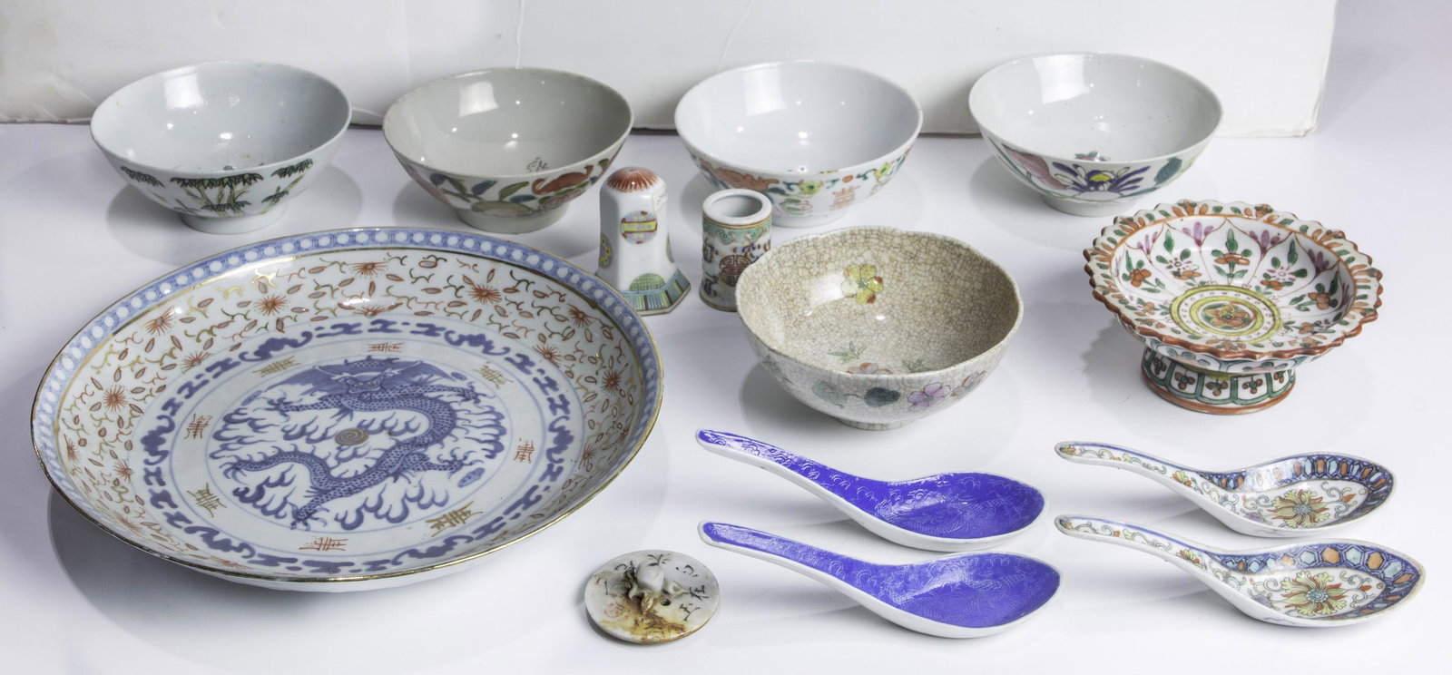 (lot of 13) Chinese enameled porcelain wares: (lot of 13) Chinese enameled porcelain wares, comprising a stem bowl, five bowls, four spoons, one dish, a toothpick holder, and a salt, largest 9.375"dia.