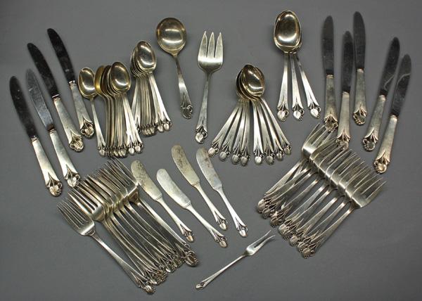 Frank Smith Silver Company flatware: Frank Smith Silver Company partial flatware in the ''Woodlily'' pattern consisting of nine dinner knives, two dinner forks, seven salad forks, five dessert forks, eighteen teaspoons, five soup spoons,