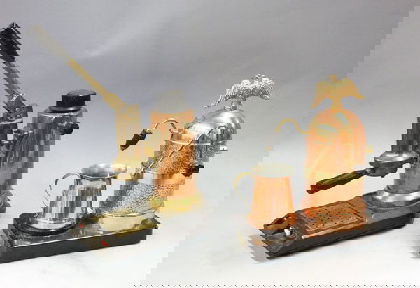 Italian coffee press: (lot of 2) Italian brass and copper coffee makers, one manufactured by Vesubio, and having an eagle finial 13''h, with a manual press maker, 18.5''h (lacking power cord)