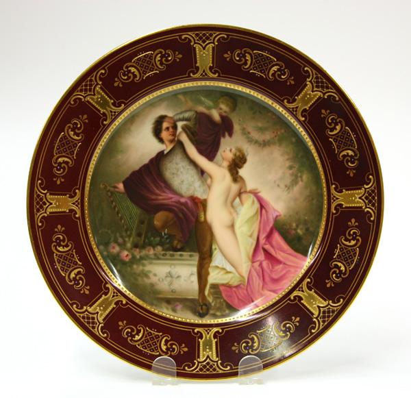 Royal Vienna Cabinet Plate: Royal Vienna hand painted cabinet plate, the burgundy and raised gilt border surrounding the central panel depicting ''Tannhauser and Venus'', signed lower right K. Weh, verso with underglaze beehive 