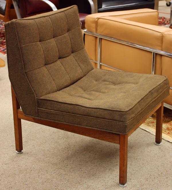 Florence Knoll # 51 lounge chair with a wood fram: Florence Knoll, for Knoll International, armless #51 lounge chair, upholstered in Knoll Arno brown wool fabric, raised on a teak wood frame, 31''h x 25''w x 30''d