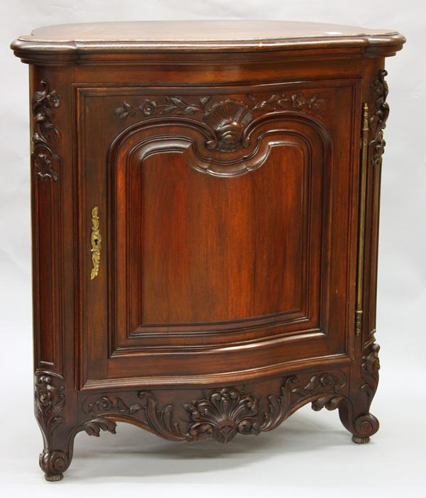 French Provincial style credenza: Rococo style walnut commode circa 1880, having a serpentine top above the conforming single door case, rising on carved cabriole legs, 42.5''h x 39.5''w x 21''d
