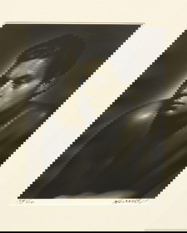 Photo, George Hurrell, Johnny Weismuller: Unframed gelatin silver print, ''Johnny Weismuller,'' 1932, by George Hurrell (American, 1904-1992), signed ''Hurrell'' lower right, edition 24/110, label affixed verso, sight: 14''h x 10.5''w, overal