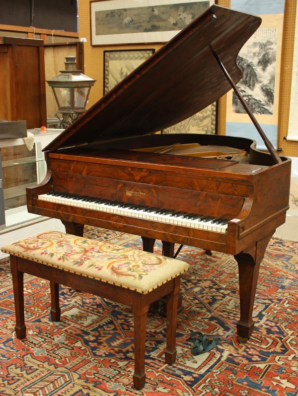 Kranich and Bach baby grand piano: Kranich-&-Bach, New York, grand piano, circa 1915, serial number 53540, having a rosewood case and ivory keys, approx 38''h x 53.5''w x 68''d