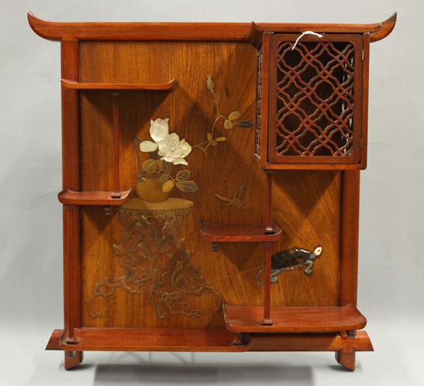 Japanese Wood Stand w/Lacquer and Inlay, Meiji: Stained mahogany display unit with a Meiji period Japanese panel, the top rail with up-turned ends repeated on the open staggered shelves and to the top of a reticulated rectangular compartment on the