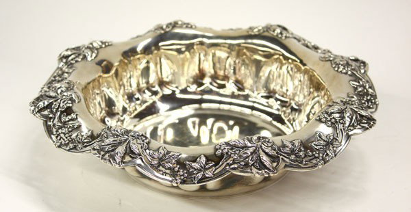 Black Starr & Frost sterling bowl: Black Starr & Frost sterling silver bowl having a pierced and scalloped everted rim decorated with a chased grape on vine motif, 12'' diameter, 23.6 troy pz.