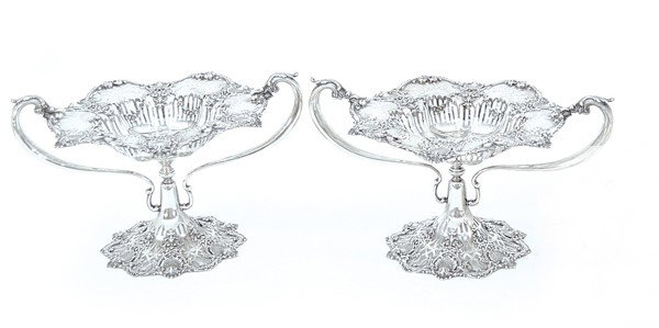 Black Starr & Frost sterling compotes: Pair of Black Starr & Frost sterling silver compotes finely executed with s-scroll handles and overall reticulation, the rim and base showing chased acanthus scrolls and centered shell cartouches, the