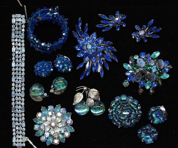 Weiss, Laguna, Coro fashion jewelry: (lot of 11) Weiss bracelet in pale blue faceted rhinestones, a Laguna bracelet and earring combo in sapphire blue Aurora Borealis beads, a Laguna brooch and clip-on earring combination in floriform bl