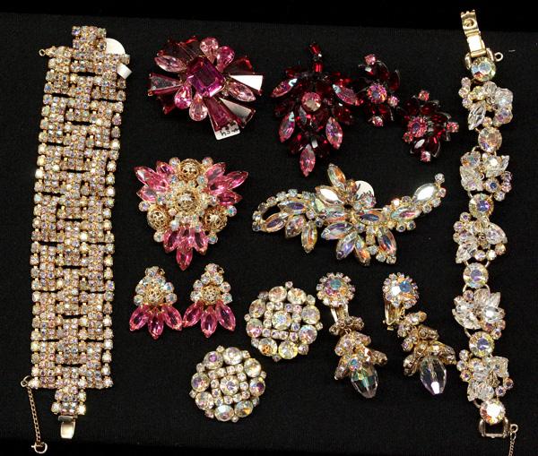 Lot of fashion jewelry: (lot of 10) Pieces of fashion jewelry including; a Pair of Sherman round pale aurora borealis rhinestone clip-on earrings, a gold tone pale aurora borealis rhinestone bracelet, brooch and dangle clip-