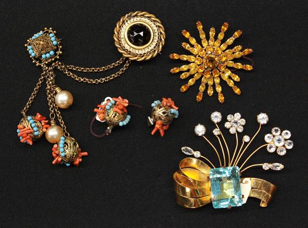 Adele Simpson fashion jewelry: (lot of 4) Pieces of Adele Simpson fashion jewelry including; a gold tone cloak pin and earring set with coral color and pale blue beaded decoration, a gold tone flower-spray brooch centered by a larg