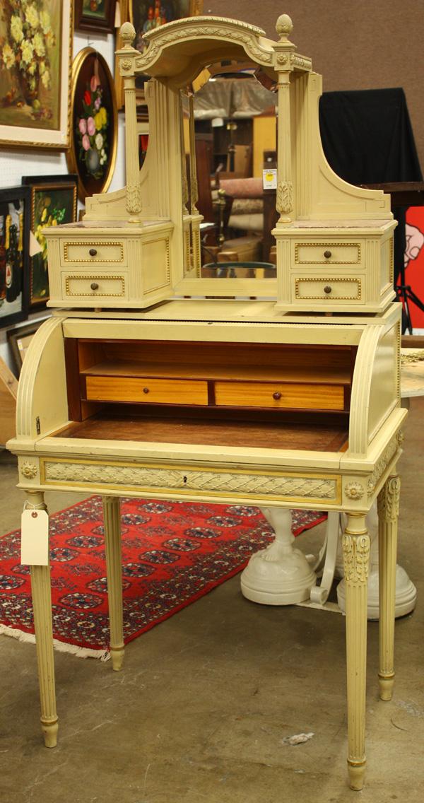 French painted and gilt accented desk: French painted and gilt accented desk, the upper section centered with a beveled mirror flanked by inset marble over two drawers over a roll top fitted interior on fluted legs, 63''h x 31.5''w x 19.5'