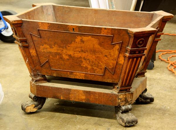 English wine cellarette: English wine cellarette, the casket form case executed in walnut with walnut burl reserves raised on boldly carved paw feet, retains partial original tin lining, 20''h x 32''w x 22''d (lacking top, lo