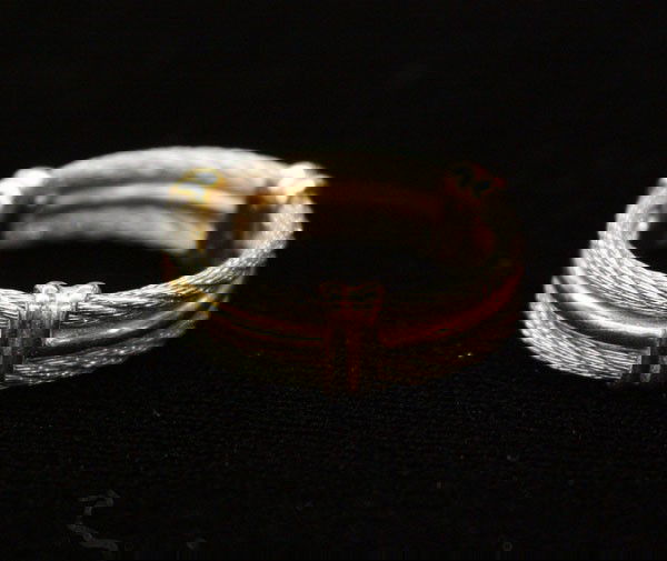 Philippe Charriol band ring yellow gold silver: Philippe Charriol band ring; mounted in silver and 18k yellow gold. Total ring weight 5.2 grams. Ring size 8