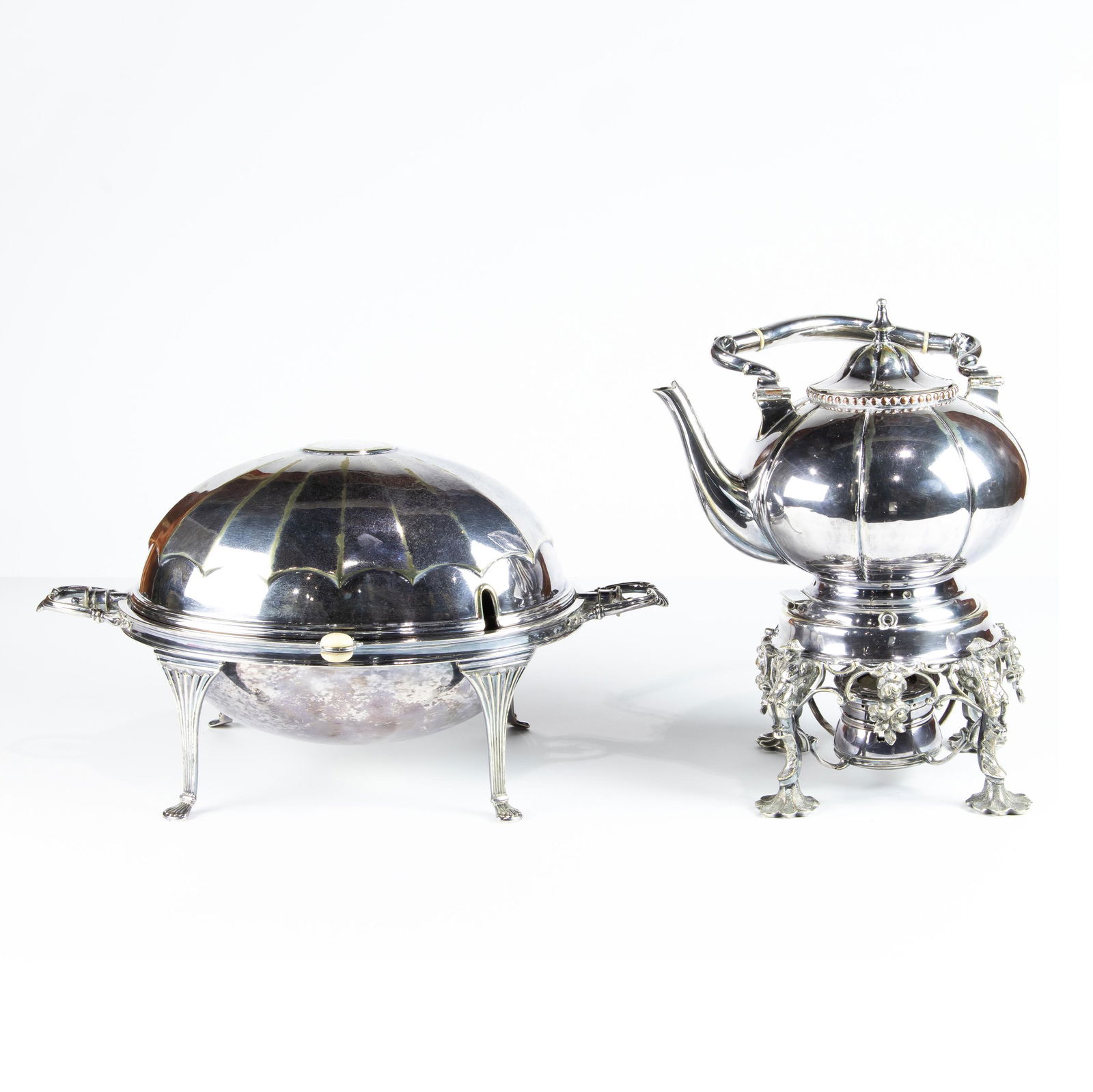 (Lot of 2) Chinoiserie plated tea kettle on stand &: (Lot of 2) Plated hollow ware items, late 19th century: a Chinoiserie tea kettle on stand together with an EPNS bun warmer with a rvolving globe form flip top 8.5"h x 16.5"w