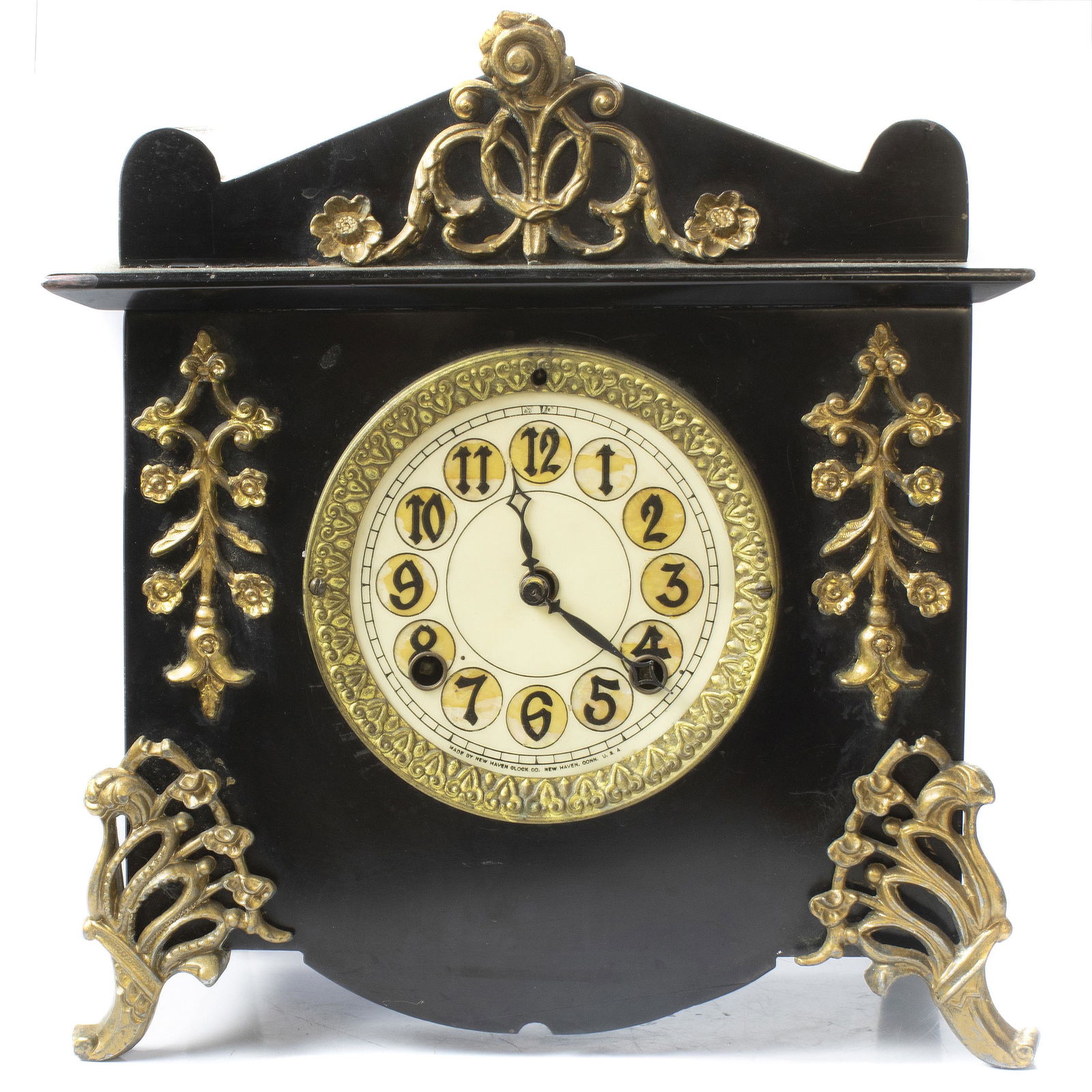 New Haven Clock Company ebonized cased mantel clock: New Haven Clock Company enameled metal mantel clock, the dial with Gothic script numerals 12" x 11.5" x 5"