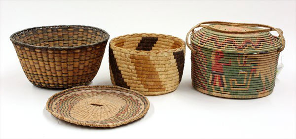 Native American basketry: (lot of 4) Native American baskets together with an old Mexican lidded basket including one Hopi geometric wicker basket, Hopi wicker peach basket, and a coiled Papago basket