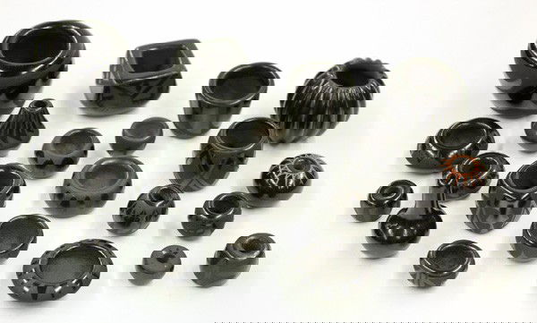 San Ildefonso blackware pottery: (lot of 22) Santa Clara or San Ildefonso miniature blackware pueblo pottery vessels, some signed