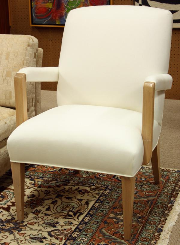 Gilbert Rohde upholstered armchair: Gilbert Rohde (1894-1944) armchair, seat and back upholstered in white cotton ticking, rising on tapered maple legs (original finish), 36''h x 25.5''w x 26''d